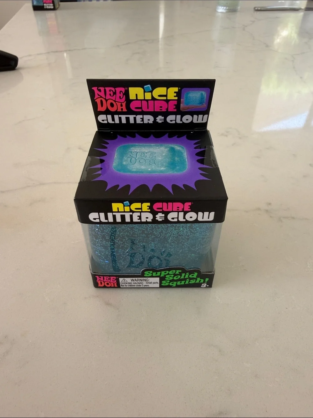 NEW unopened box NeeDoh Nice Cube Glitter & Glow Blue Squishy Toy
